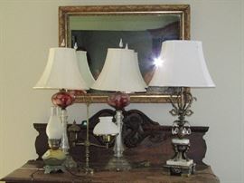 Various glass lamps with crystals, milk glass, etc