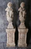 Pair of Continental terracotta garden figures and pedestals. Overall height: 55"