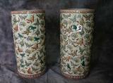 Pair of Chinese rose Canton porcelain umbrella stands decorated with butterflies. 18 1/4"