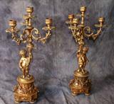 Pair of Continental bronze figural four-branch candelabra. H: 18 1/4"