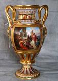 Royal Vienna porcelain vase with double snake form handles.