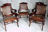 Five regency style mahogany and cane arm chairs with double cane backs. H: 36" W: 17 1/2" D: 22"