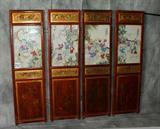 Four Chinese lacquer and parcel gilt wood panels with porcelain plaques. H: 54 1/4" x 15 1/2" Plaques: 19 1/2" x 13"