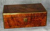 English Rosewood lap desk, with brass inlaid cartouche and escutcheon. H: 6 1/4" W: 16" D: 9 1/2"