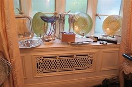 items in window sill, silver and art glass