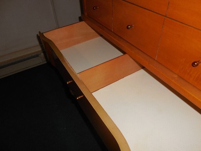 Dividers in drawers of dresser. 