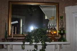 Lovely mirror.  Oil lamps