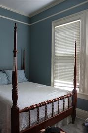 Four post bed.  Beautiful detail.  Includes all pillows and linens on bed.