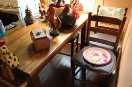 Great pine kitchen table and four chairs.  Great collection of roosters.