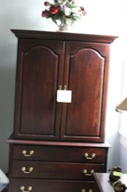 This armoire looks tilted ---- but it's the one taking the photo!  It has been repurposed for hanging clothes.  We have the shelves for restoring. 