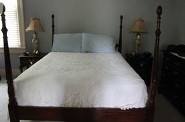 Poster bed #3.  Comes with pillows, linens, mattress and bedspread.