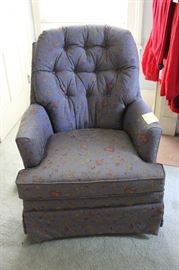 Beautifully upholstered swivel chair.  The colors are beautiful.