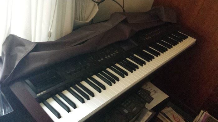 Roland Digital piano. Full keyboard. Includes cover and bench, plus converter & instruction manual.