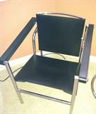 One of three Leather Strap & Chrome Armchairs