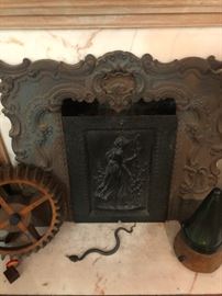 antique ornate cast iron fireplace surround and cast iron fireplace cover