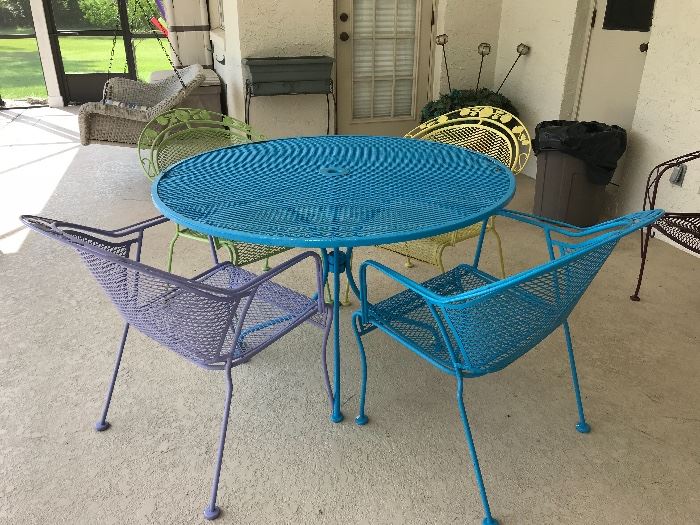 Metal patio table.  There are 6 matching chairs.