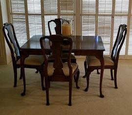 beautiful smaller size drop leaf dining table and four chairs with checked fabric seats