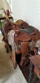 Simco vintage western saddle in the foreground now $350