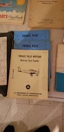 Lot's of airplane and flight booklets and manuals
