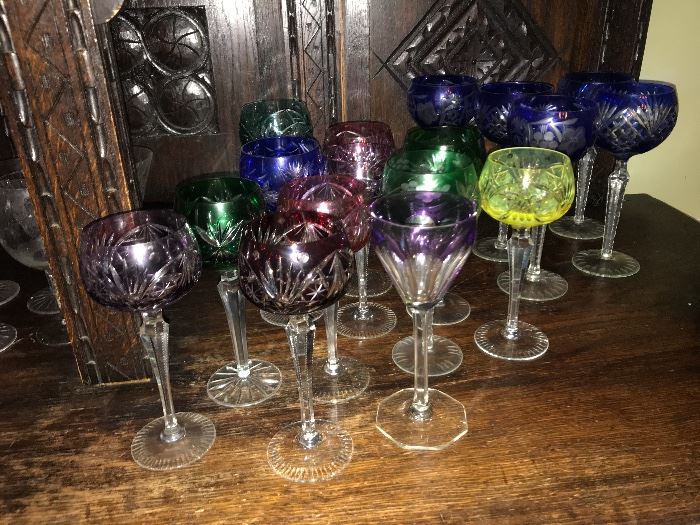 collection of cut to clear multicolored wine glasses