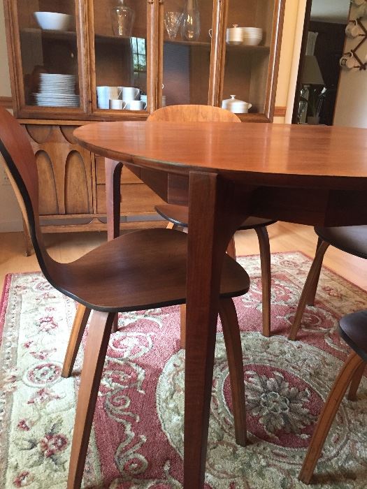 Mid-Century Modern  Dining table (48" round) + leaves, 6 chairs (5 side and 1 arm) - EXCELLENT CONDITION - Also available:  china hutch and sideboard - also shown:  Area Rug