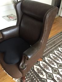 "leather" office chair and area rug