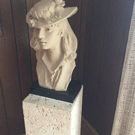Ceramic "bust" with fossil stone stand