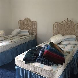 Twin beds with wicker headboards