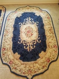 Royal Palace room size wool scalloped rug in lapis