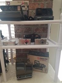 Polaroid & Cannon cameras