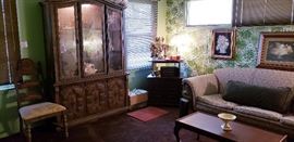 vintage china cabinet, antique sofa, antique chair, antique coffee table, end table