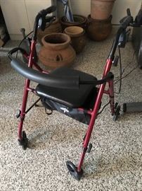 Rollator walker with seat
