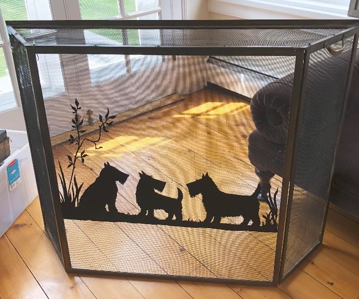Circa 1940 fire screen of 3 Scottie dogs attributed to the British artist Marguerite Kirmse (1885-1954). In very good condition with only minor wear in a few spots, measuring 34" high x 45" wide x 9 ½" deep. 