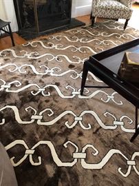 MADELEINE WEINRIB SILK/WOOL RUG 
Hand-knotted Islington Brown with "S-link" cream pattern on a chocolate brown ground, 9 x 12 feet. And a second GEORGE SMITH ARMCHAIR in background. 