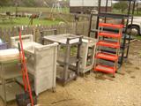 Assorted Busboy carts and shelves