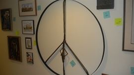 steel sculpture. Made of metal blades, stamped Sheffield, England. Artist Nora Dorf (sp?), featured in an art show called Peace