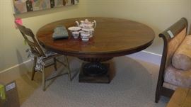 round coffee table, low to ground. comes with side extensions which screw on at bottom