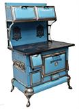 FOUR ANTIQUE STOVES
