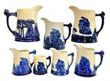 COLLECTION OF “OLD SLEEPY EYE” PITCHERS