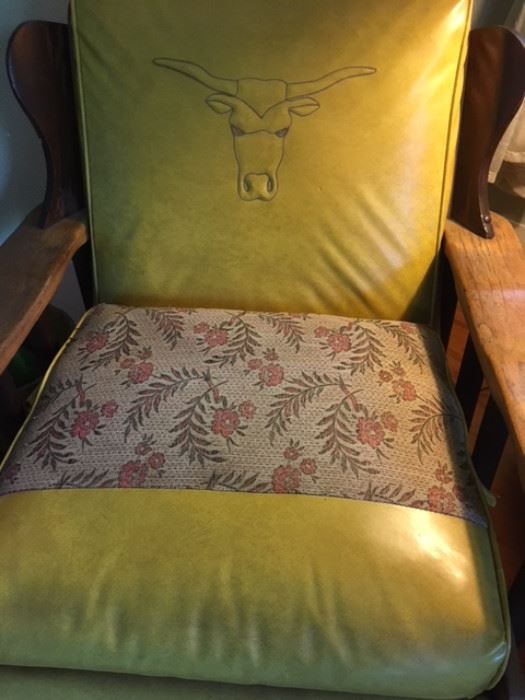 1950s vinyl, cloth and wood yoke-style rocker with embossed longhorn