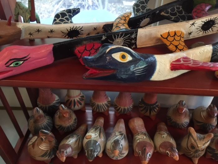 Mix of painted ceramic birds and painted seed pods dragon tourist collectibles
