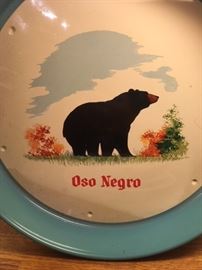 One of a pair of Oso Negro painted tin bar trays