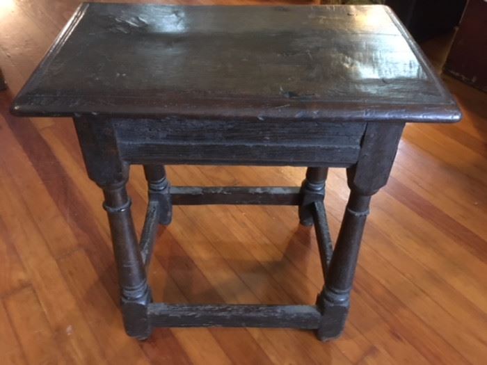 Primitive English country four-legged table with single plank burled wood top and hand turned legs