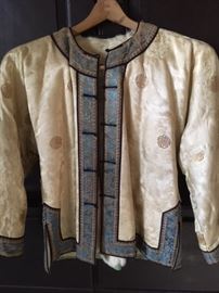 Asian silk jacket with white ermine lining
