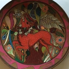 One of a few 10" hand-painted ceramic plates, tourist collectibles