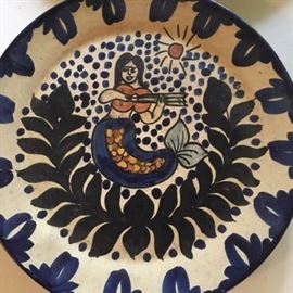 Another hand-painted ceramic plate