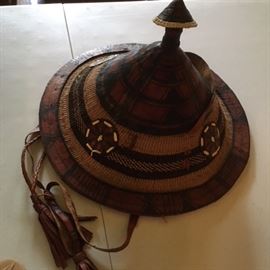 African conicald hat in leather and grass