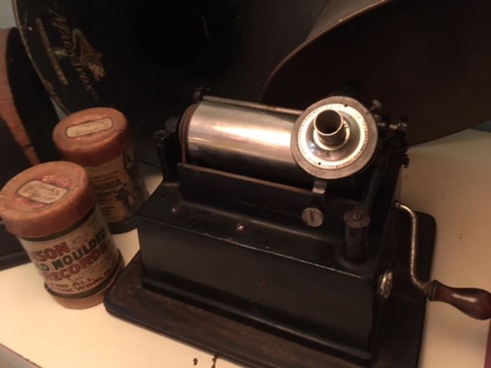 Detail of Edison phonograph and a few of several cylinder records