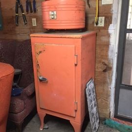 Orange painted General Electric refrigerator