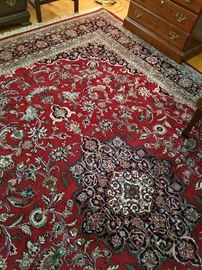 Hand knotted red and navy rug from India